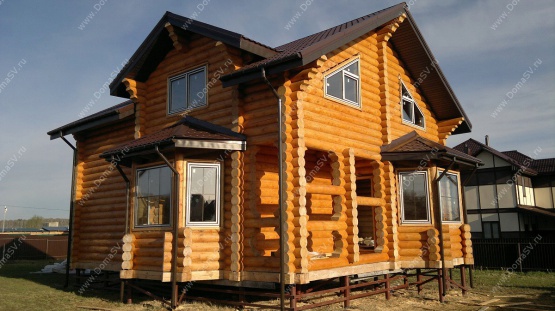 Фотографии необычных проектов деревянных домов